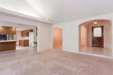 View from the family room to the open island kitch