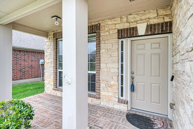 Your covered front porch offers a nice sitting area for you to enjoy your neighborhood.