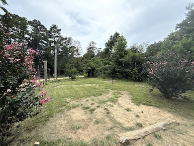 View of the fenced portion of the front yard when