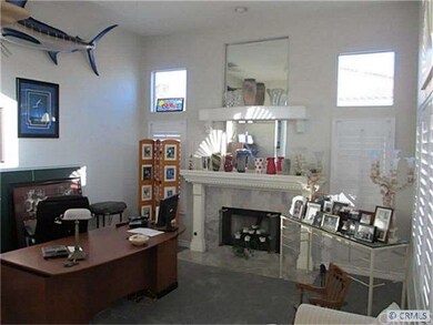 Formal living room currently used as an office