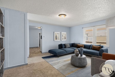 PHOTO IS DIGITALLY STAGED