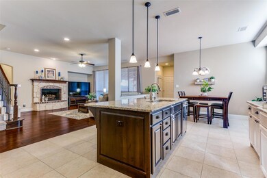 Kitchen with living areas beyond.