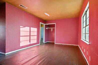 (View I) 21' x 17' Living Room:  Ample natural sun