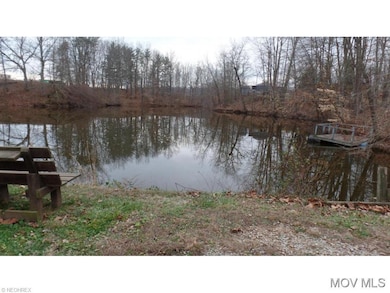 Pond in front of house