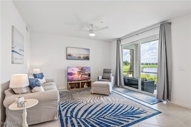Tiled living room with ceiling fan