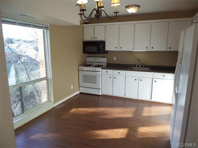 Eat-In Kitchen has Plenty of Cabinets & Countertop