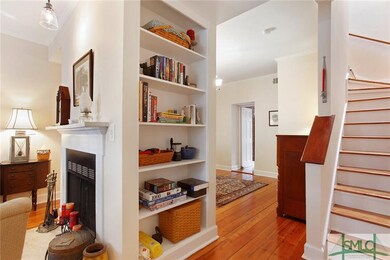 The fireplace and complimentary built-in shelving 