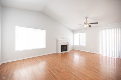 Unfurnished living room with lofted ceiling, ceili