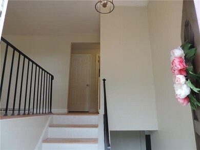 The split entry leads to the main living area or t
