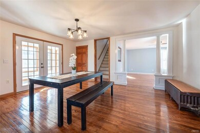 Light galore! view of back  enclosed porch, living