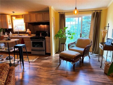 The reading nook by the kitchen could also be a di