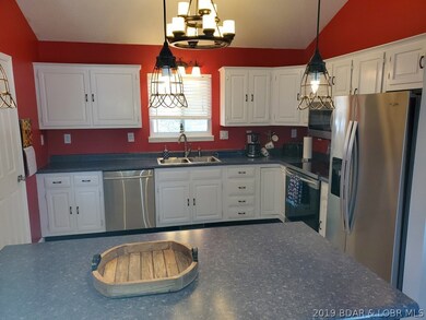New S/S appliances, sink w/garbage disposal.