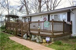 GIGANTIC PORCH THAT WRAPS AROUND TO THE LEFT SIDE OF THE HOME!