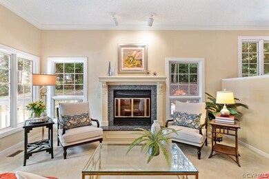 Gorgeous family room with large windows that look