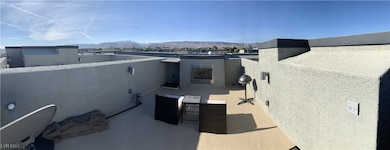 4th floor rooftop deck with fireplace