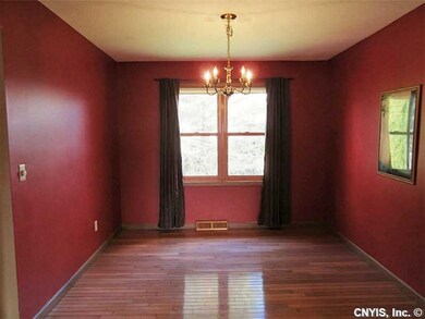 Dining Room. Gleaming hardwood floors.