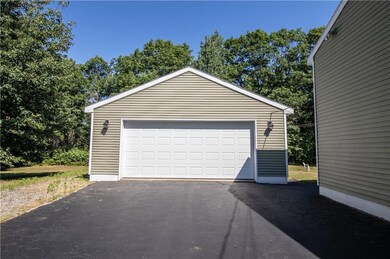 Spacious 2 car garage with lots of...