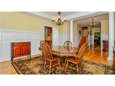 Check out the millwork in this gorgeous Dining Roo