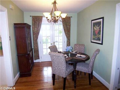 Dining Room - French doors lead out to the HUGE sc