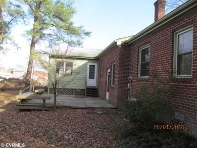 Exterior Back - Large deck and rear view of home