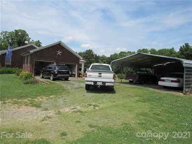 2 car garage and a 2 car carport