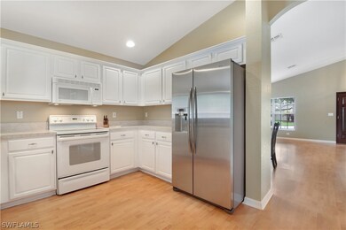 Cozy Kitchen Design w/ Plant Shelving & Recessed L