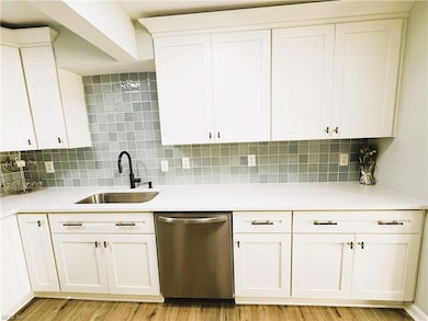 Quartz Counter Tops, High End Stainless Steel Appliances, Ceramic Tile Backsplash