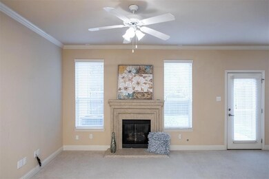 Dual, extended windows frame the colonial-styled f