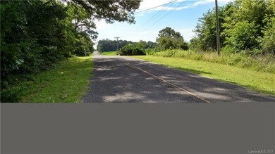 View of road coming to property.