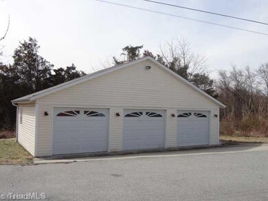 Parking Lot/Garage. 3 Car garage is an unusual fine in this price range