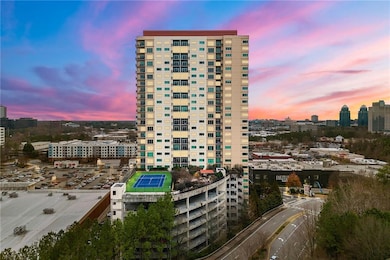 Property at dusk with a city view