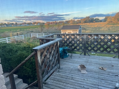 Deck featuring a storage unit