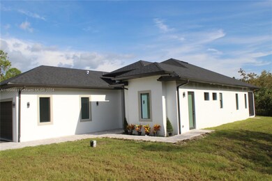 248 Shady Hollow Blvd E, Naples, FL 34120 - photo 2