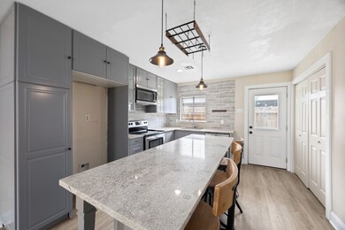 Beautiful quartz countertops and a spacious island