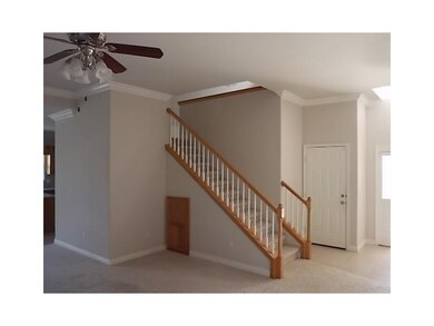 Living Room. Stairs from living room to family room upstairs