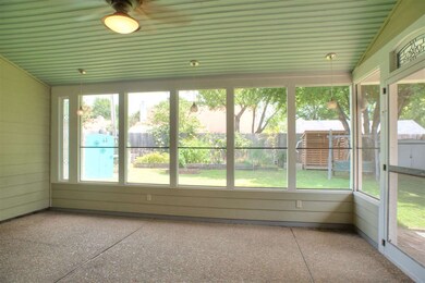 ENCLOSED BACK PORCH