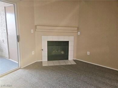 Cozy gas fireplace and mantle in the living room