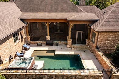 Heated Salt water pool with waterfall.  Hot tub in