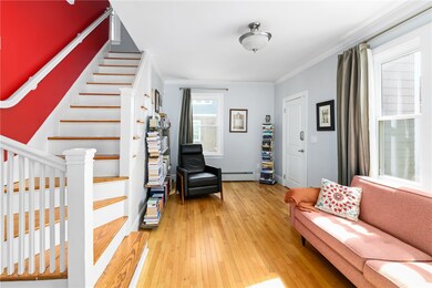 Southern facing living room has beautiful hardwood