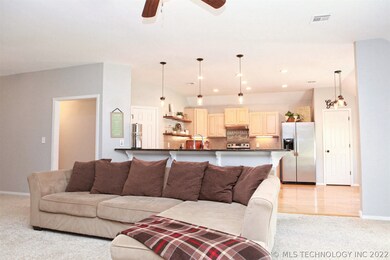 Great room is very opened to the kitchen, bar area
