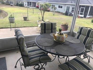 Screened in Porch overlooking pond