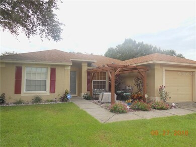 Front of home with pergola sitting area!