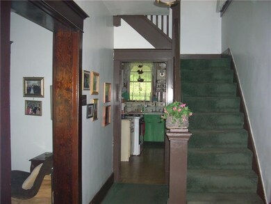 Looking into the kitchen-Living room on left-Stair
