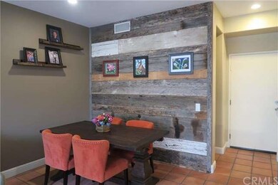 Awesome rustic wood accent wall in dining area.