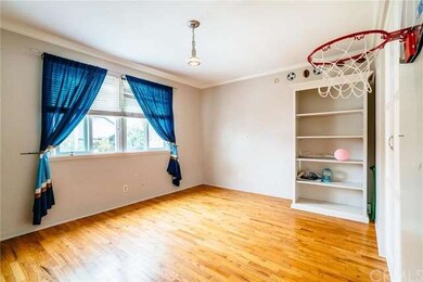 Bedroom with hardwood floors