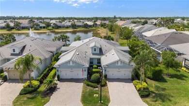 Bird's eye view with a water view and a residentia