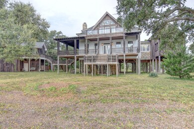 7653 Myrtle Grove 3 Elevation from Yard