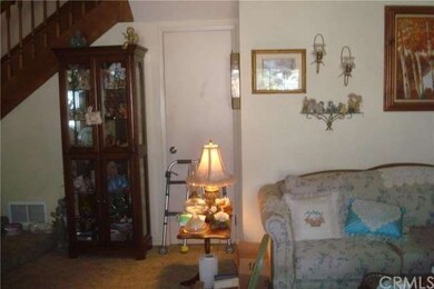 Door leads to storage under stairs