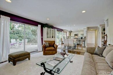 Light and bright family room, which opens to the d