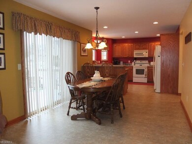 Dinette has access to the back deck.